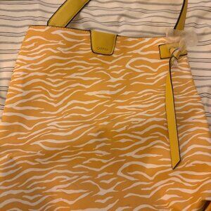 vibrant yellow and white patterned tote bag